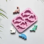 Molde de silicon en forma de dinosaurios